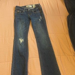 Boot Cut Jeans and low rise waist.